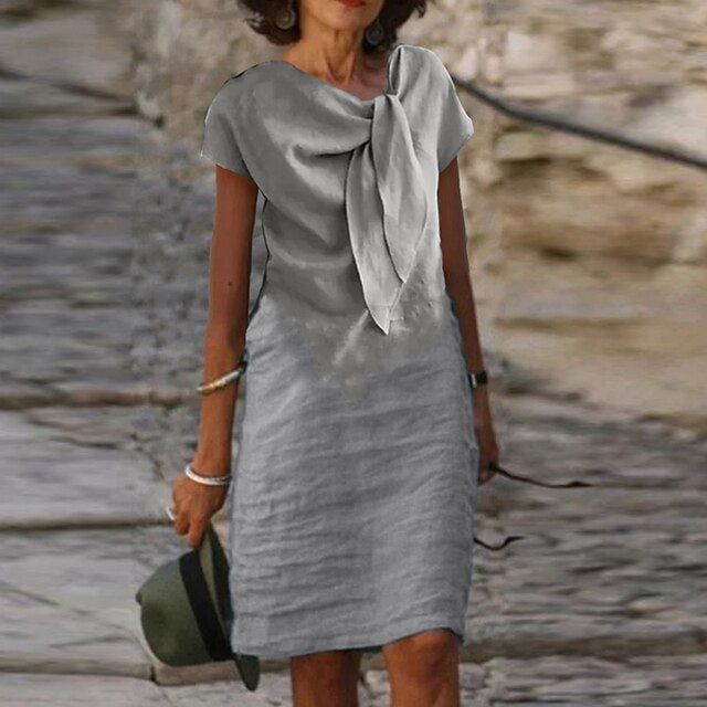 Women’s Evening Dress – Mini Length – Relaxed Fit – Short Sleeve – Statement Bow – Breathable Blend
