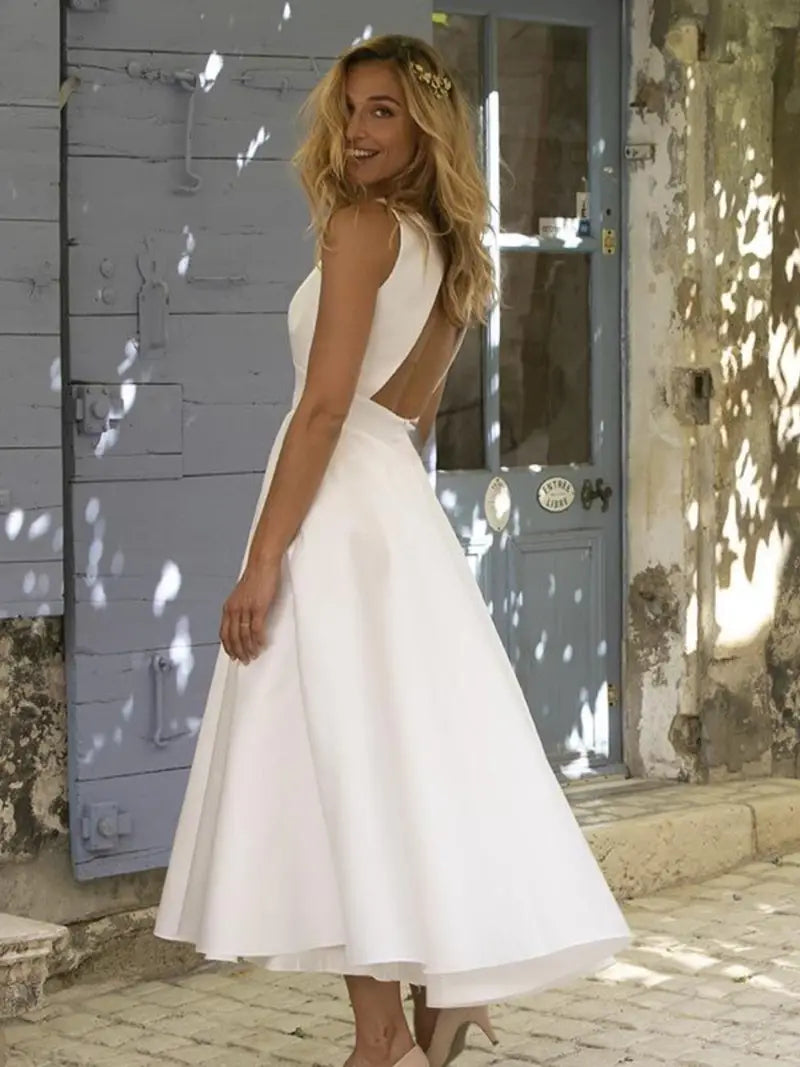 Weißes Hochzeitsgast- und festliches Kleid für Damen – ohne Ärmel und mit einem langen