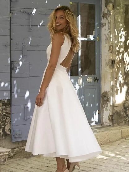 Weißes Hochzeitsgast- und festliches Kleid für Damen – ohne Ärmel und mit einem langen