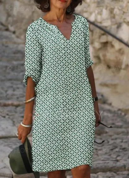 Grün modische Kleid für Damen mit V-Ausschnitt und geometrischem Aufdruck
