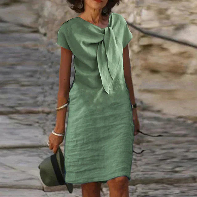 Women’s Evening Dress – Mini Length – Relaxed Fit – Short Sleeve – Statement Bow – Breathable Blend