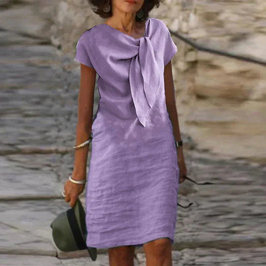 Women’s Evening Dress – Mini Length – Relaxed Fit – Short Sleeve – Statement Bow – Breathable Blend