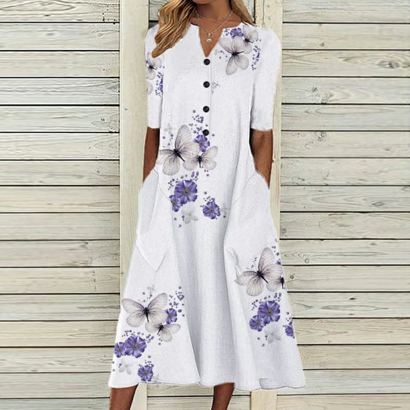 Pretty summer dress with buttons and pockets for women